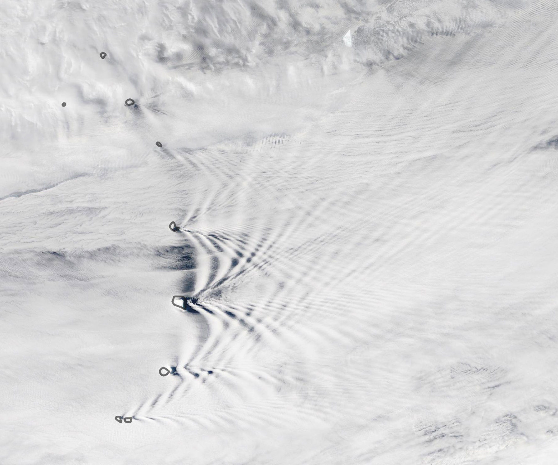 Wave clouds from the South Sandwich Islands create ripples downwind. Credit: NASA Earth Observatory image by Lauren Dauphin, using MODIS data from NASA EOSDIS/LANCE and GIBS/Worldview. 
