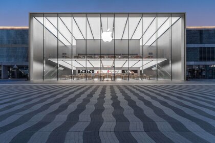 The Apple logo displayed on the facade of an Apple Store