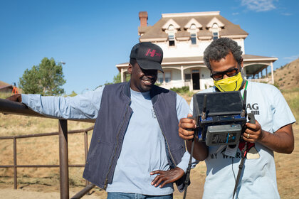 Left to right: Daniel Kaluuya and Writer/Director/Producer Jordan Peele on the set of NOPE