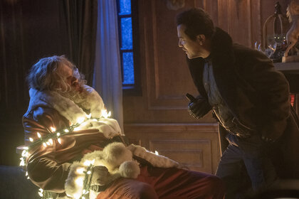 (from left) David Harbour and John Leguizamo on the set of Violent Night.