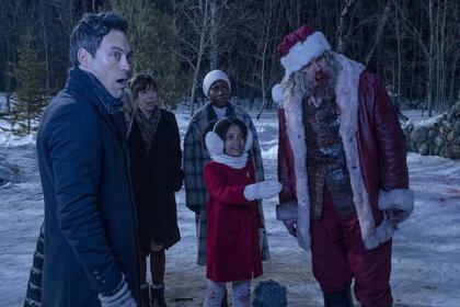 (from left) Jason (Alex Hassell), Gertrude (Beverly D’Angelo), Alva (Edi Patterson), Linda (Alexis Louder), Trudy (Leah Brady) and Santa (David Harbour) in Violent Night, directed by Tommy Wirkola.