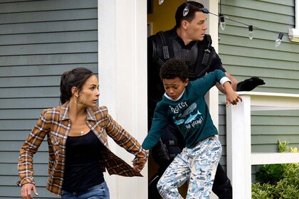 (counterclockwise, from left) Mia (Jordana Brewster), Little Brian (Leo Ablo Perry), and Jakob (John Cena) in Fast X (2023)