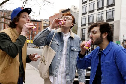 Martin Herlihy, Ben Marshall, and John Higgins chug Pepto Bismol during a Saturday Night Live sketch