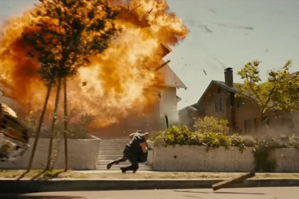 Vin Diesel thrown to the ground by a house explosion
