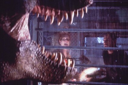 Julianne Moore and Vince Vaughn scream at a T-Rex in The Lost World: Jurassic Park (1997)