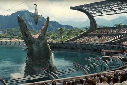 A Mosasaurus in a massive pool stadium goes to eat a whale  in the  Jurassic Park film series.