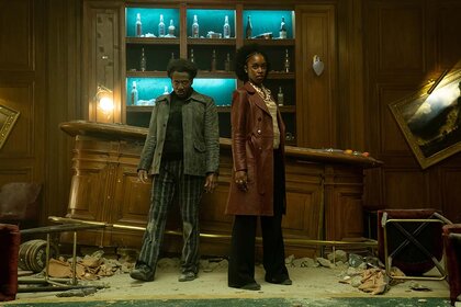(L-R) Hubert Point-Du Jour as Miles and Jessica Allain as Lou in The Continental: From the World of John Wick