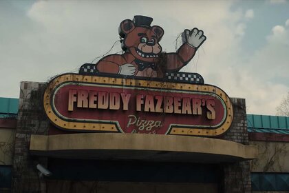 Freddy Fazbear's Pizza sign featuring a waving Freddy in Five Night's at Freddy's (2023)