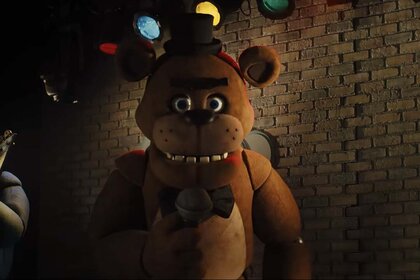 Freddy Fazbear stares in Five Night's at Freddy's (2023)