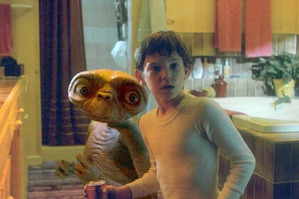ET and Elliott (Henry Thomas) appear in a bathroom in E.T. The Extra-Terrestrial (1982).