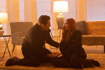 Luke Roman (Tim Rozon) tends to Susan Ireland (Sarah Levy) on the ground in SurrealEstate 210