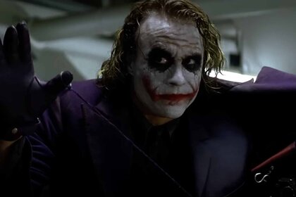 The Joker (Heath Ledger) appears in his iconic makeup in The Dark Knight (2008).