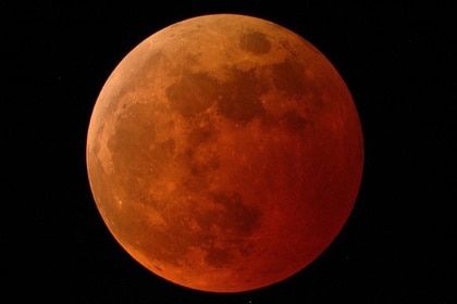 A blood moon during a total lunar eclipse.