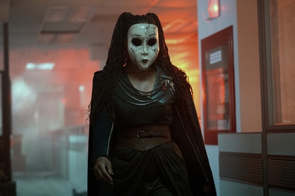 Dollface stands in a hallway on Twisted Metal Season 2.