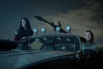 Quiet and Mayhem sit In a car together in Twisted Metal Season 2.