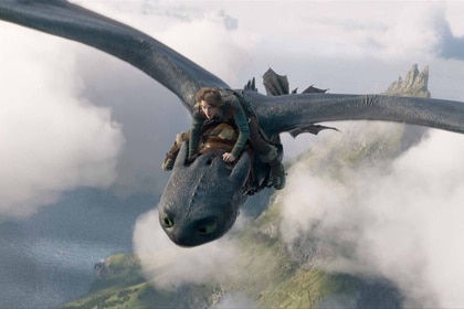 Hiccup rides on Toothles in How to Train Your Dragon (2025).