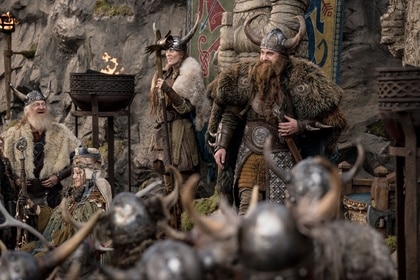 Stoick (Gerard Butler) stands in front of his tribe while donning fur and horns.