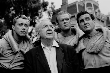 Don Dubbins, Cecil Kellaway, Kevin Hagen, and Jeff Morrow gaze off into the distance as a house sits in the background on The Twilight Zone Episode 120.