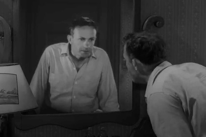 Jackie Rhoades (Joe Mantell) speaks to his reflection in The Twilight Zone Episode 203.