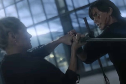 Andy (Charlize Theron) and Discord (Uma Thurman) grapple over a sword in The Old Guard 2 (2025).