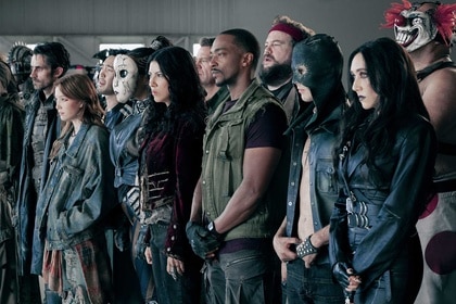Mr. Grimm, Mayhem, Chuckie Floop , Dollface, Quiet, Dave, John Doe, Stu, Deacon, Raven, and Sweet Tooth standing together in Twisted Metal Season 2. 