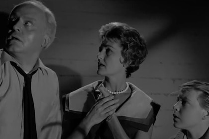 A family appears on The Twilight Zone Season 3 Episode 3 "The Shelter".