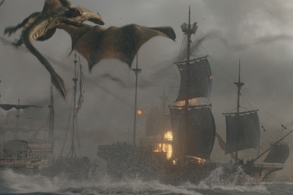 A dragon attacking a fleet of ships during the Battle of the Gullet in the season three premiere of 'House of the Dragon.'