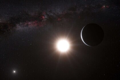 Artwork depicting an exoplanet orbiting one of the two stars making up the binary Alpha Centauri. Credit: ESO/L. Calçada/Nick Risinger (skysurvey.org)