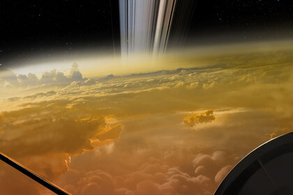 Artwork  — yes, ARTWORK — depicting a view “over the shoulder” of the Cassini spacecraft during one of the last dives toward Saturn it made before the end of the mission. Credit: NASA/JPL-Caltech