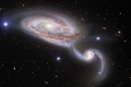 The galaxies NGC 5394 and 5395, undergoing a very close pass that’s affecting both of them. ​​​​​​​Credit: NSF’s National Optical-Infrared Astronomy Research Laboratory/Gemini Observatory/AURA