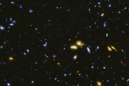 A deep Hubble image in ultraviolet, visible, and infrared light shows thousands of galaxies in the early Universe. This is the northern field of the HDUV survey. 