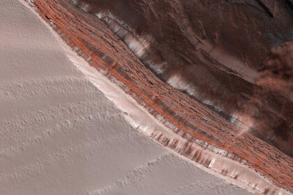 A second avalanche occurred at the same time as the other not far away, along the same canyon cliff face. Credit: NASA/JPL/University of Arizona