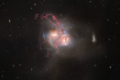 NGC 5256, a pair of colliding galaxies 350 million light years away. Credit: ESA/Hubble, NASA