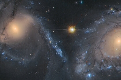 NGC 6769 (right) and 6770 (left) are two spiral galaxies on their way to a massive collision. Credit: NASA/ESA/ESO/Judy Schmidt