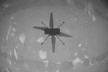 The Mars helicopter Ingenuity sees its own shadow on the surface of Mars using a downward-facing camera as it hovered. Credit: NASA/JPL-Caltech