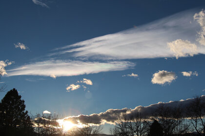 Another spectacular sunset over Boulder, Colo. Bonus: iridescent clouds. Credit: Phil Plait