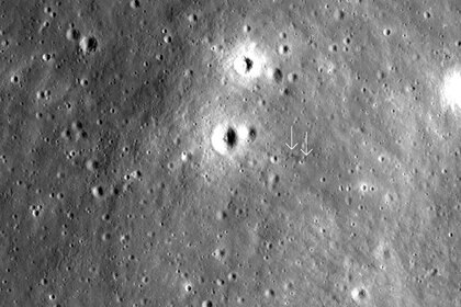 An area of the Moon where the Apollo 12 Ascent stage may have crashed, leaving a dark furrow in the surface (arrowed). Credit: NASA/GSFC/Arizona State University / Quickmap