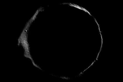 Erlanger crater, near the Moon's north pole, with just its rim lit by low sunlight. Much of the crater's floor is in permanent darkness. Credit: NASA/GSFC/Arizona State University