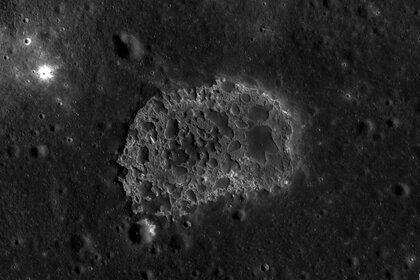 The strange formation Ina on the Moon, which sits in a smooth lava flood plain called Lacus Felicitatis. Credit: NASA/GSFC/Arizona State University / Quickmap