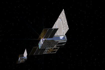 Artwork depicting the pair of Mars Cube One satellites on their way to Mars. Credit: NASA
