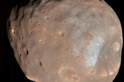 The Martian moon Phobos observed by the Mars Reconnaissance Orbiter, showing the giant crater Stickney and odd grooves covering its surface. Credit: NASA/JPL-Caltech/University of Arizona