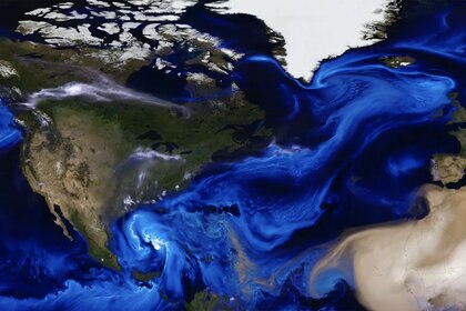 A satellite/computer map showing the movement of aerosols, particles suspended in the air, over part of the northern hemisphere. Credit: NASA's Goddard Space Flight Center