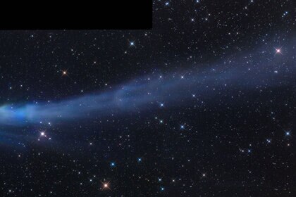 Comet C/2014 Q2 Lovejoy in late December, 2014, shows the diffuse green glow of diatomic carbon around the head, but also a spectacular tail glowing blue (likely also due at least in part to C2) that stretched for millions of kilometers.
