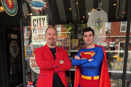 Martin Casas with Superman outside comic store