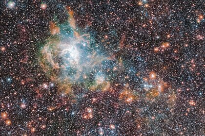 The Tarantula Nebula in infrared isn’t quite as showy as it is in visible light, but it’s still impressive. Credit: ESO/VMC Survey