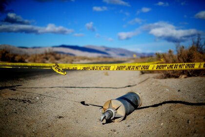 458246810-debris-from-spaceshiptwo-lies-in-a-desert-field-on.jpg