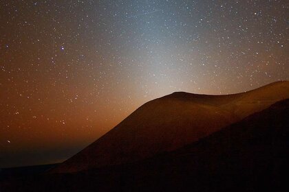 Zodiacal light, sunlight reflected off of tiny dust particles that orbit the Sun between Earth and the asteroid belt. Credit: Rogelio Bernal Andreo