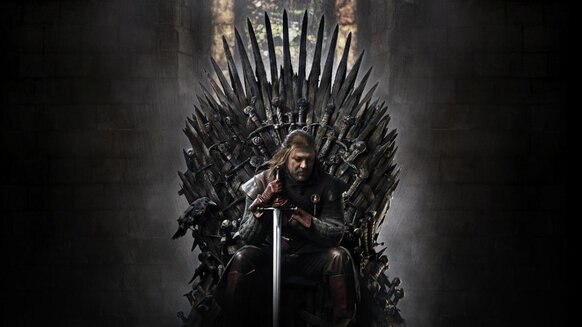 Game of Thrones' Ned Stark sits on the Iron Throne