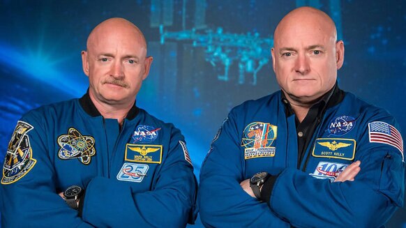 Austronauts Mark Kelly at Left with twin brother Scott Kelly