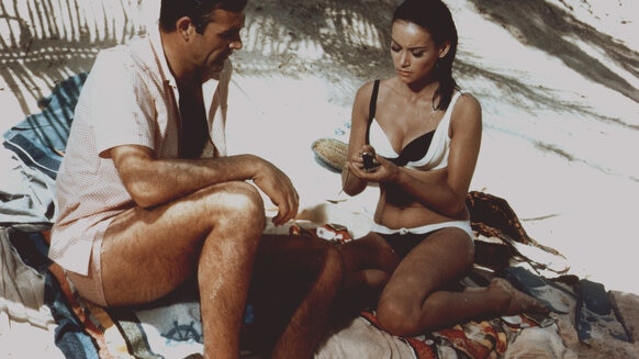 Actor Sean Connery and actress Claudine Auger on the set of 'Thunderball', directed by Terence Young,